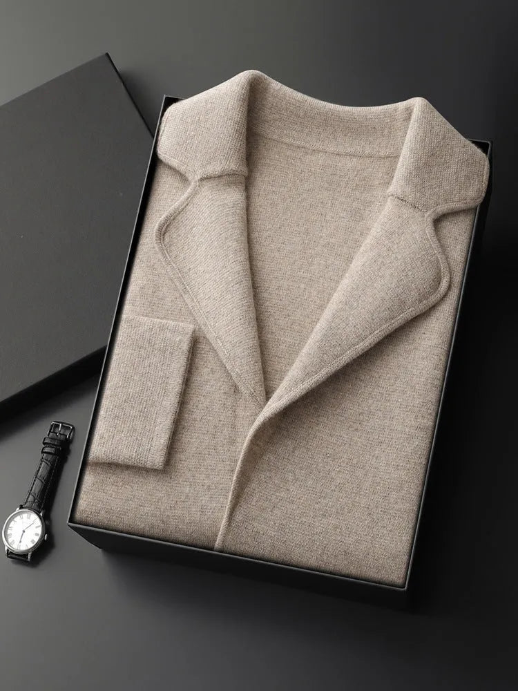Men's loose grey cashmere cardigan sweater on a hanger