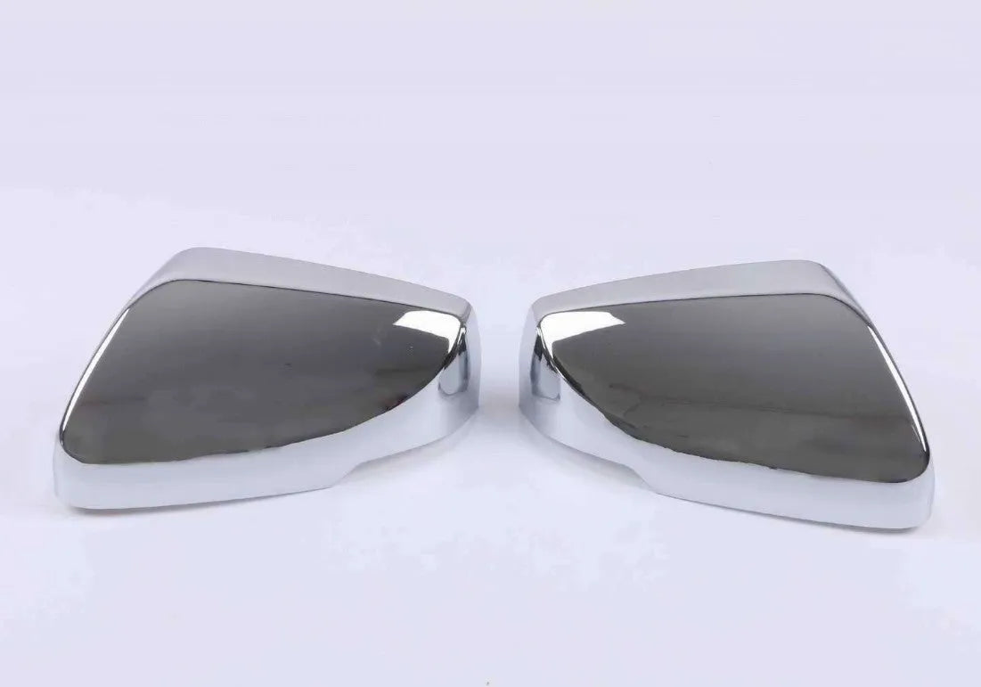 Pair of ABS plastic rearview mirror covers for Cadillac CT5 CT6 in carbon fibre, silver, and rain frame finish options.