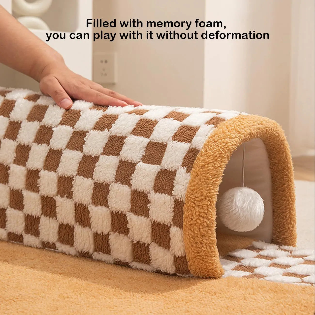 Fan shaped plush pet bed with integrated tunnel in plaid design, shown in coffee colour.
