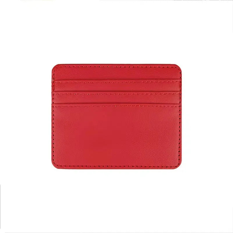 Compact leather cutting ferrule with multiple card slots in black, showing the front exterior and card storage capacity
