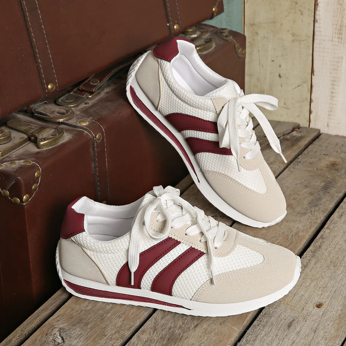 Women's wine red Cortez Retro sneakers with cross strap design and mesh lining