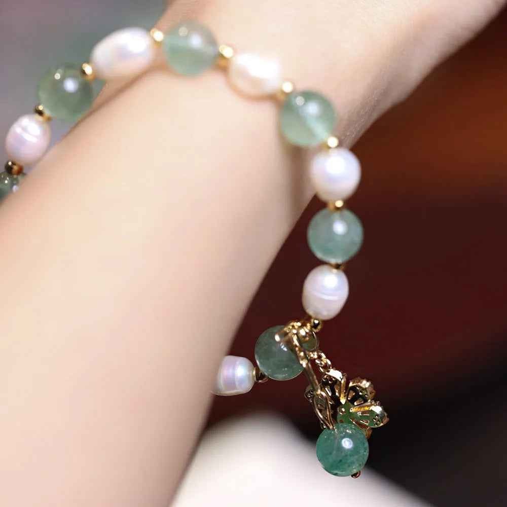 Green strawberry freshwater pearl bracelet with Chinese knot design and jade flower decorations