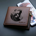 Men's leather wallet showing seven card slots and zipper closure mechanism