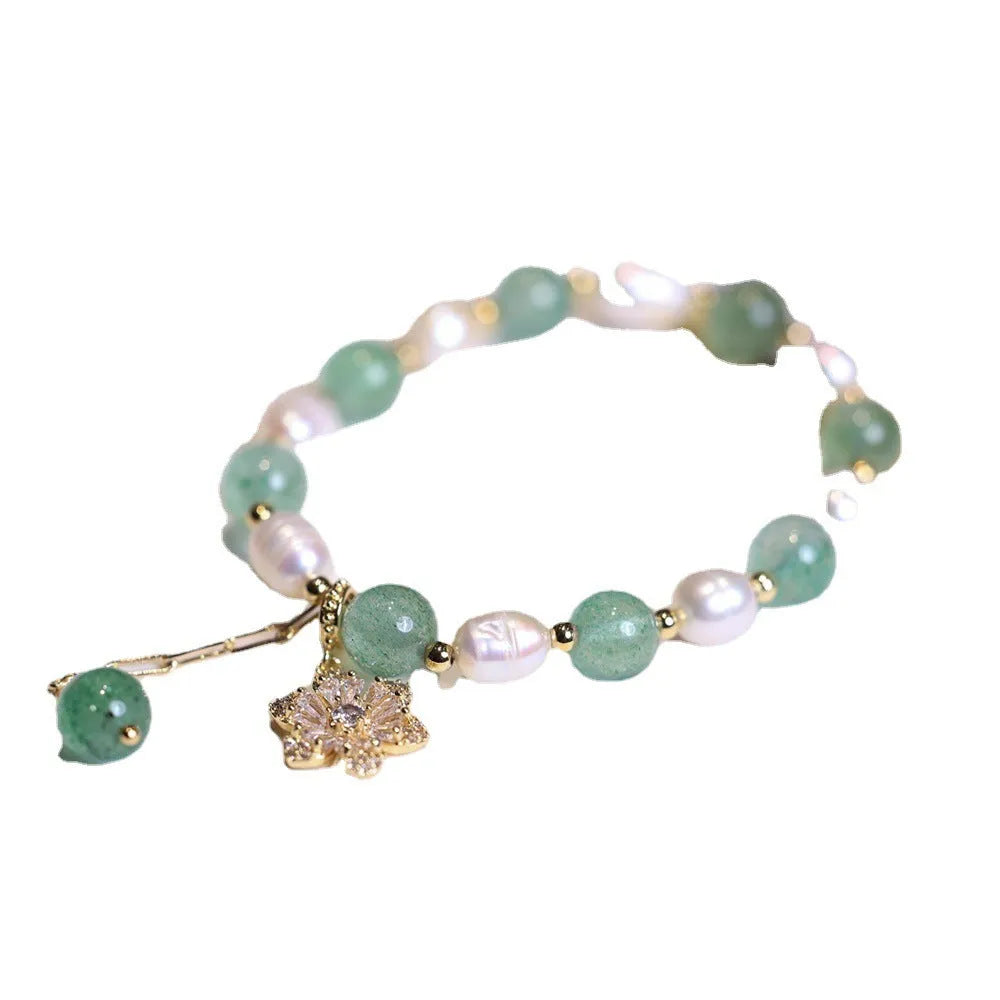 Green strawberry freshwater pearl bracelet with Chinese knot design and jade flower decorations