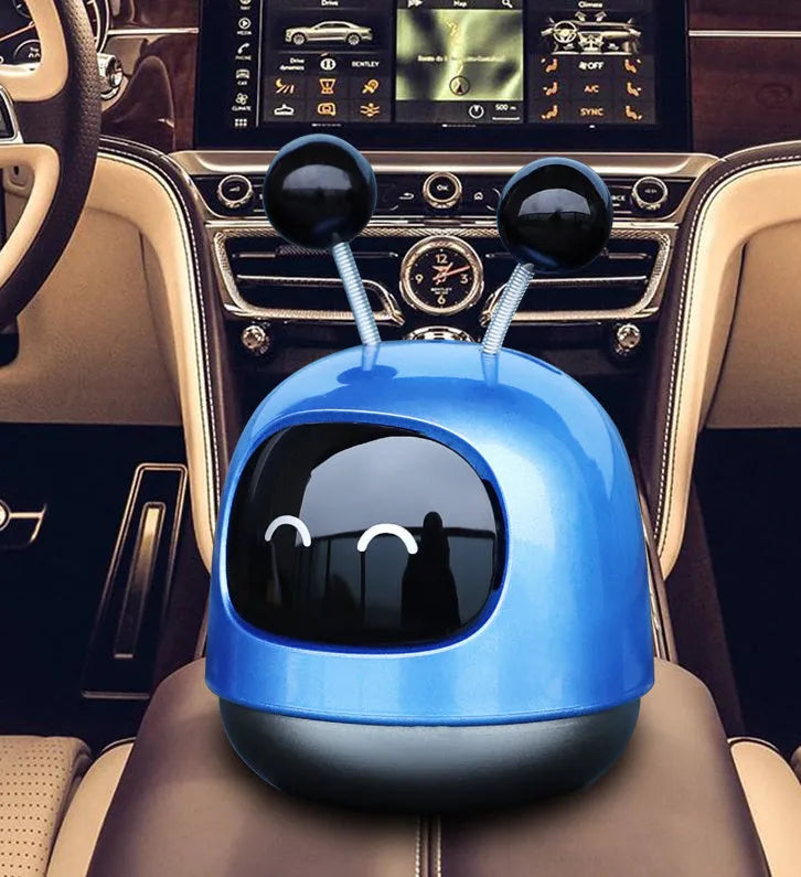 Colourful robot-shaped car vent clip aromatherapy diffuser with 40ml gel capacity.
