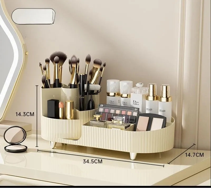 Rotating cream and black cosmetics organiser box holding makeup brushes and lipsticks on a table.