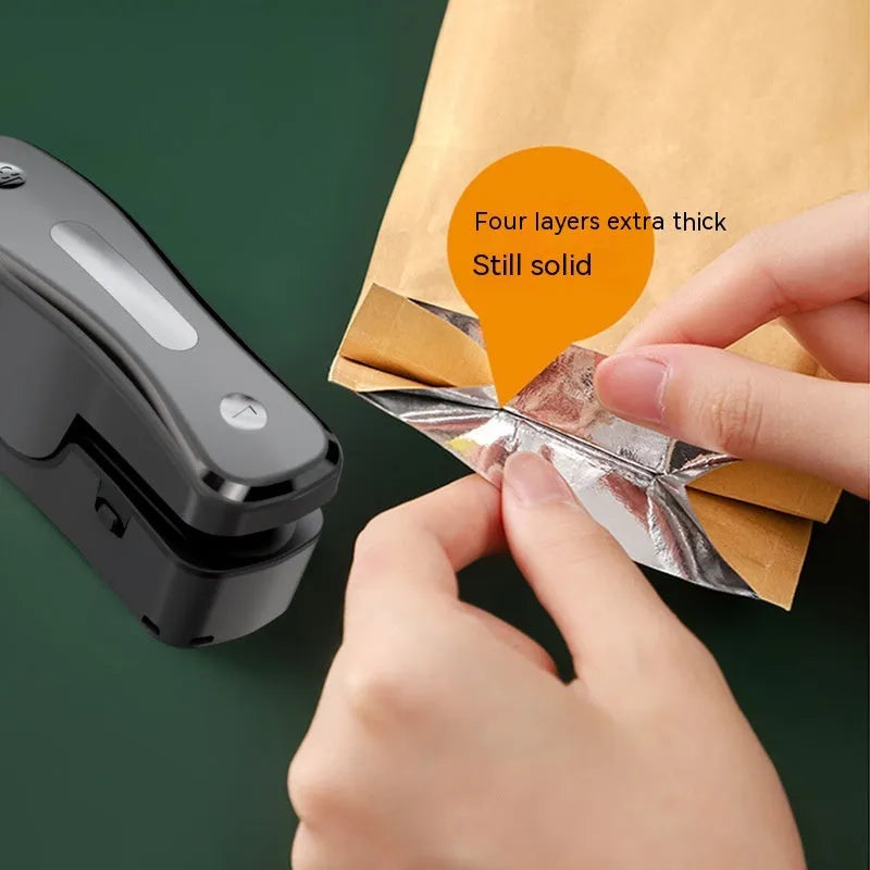 Milky white USB rechargeable mini sealing machine with magnetic patch for kitchen food preservation