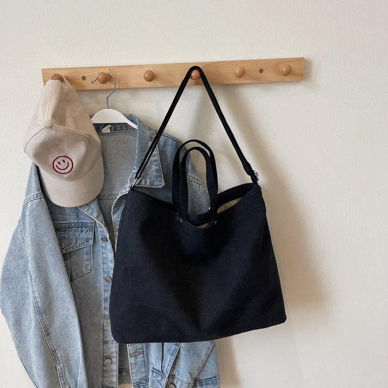 Large capacity women's casual tote bag in khaki cloth with polyester lining, sandwich pocket, and mobile phone bag
