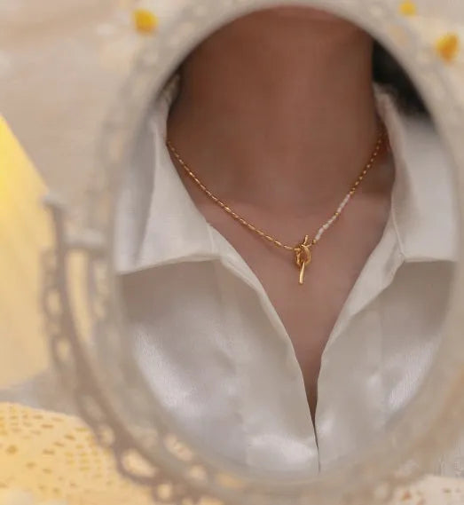Gold copper real pearl necklace with geometric ring and line design on adjustable chain