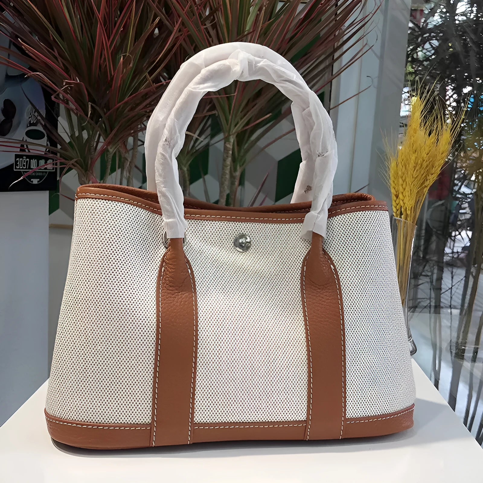 Women's genuine leather and canvas crossbody tote bucket bag with interior organisation