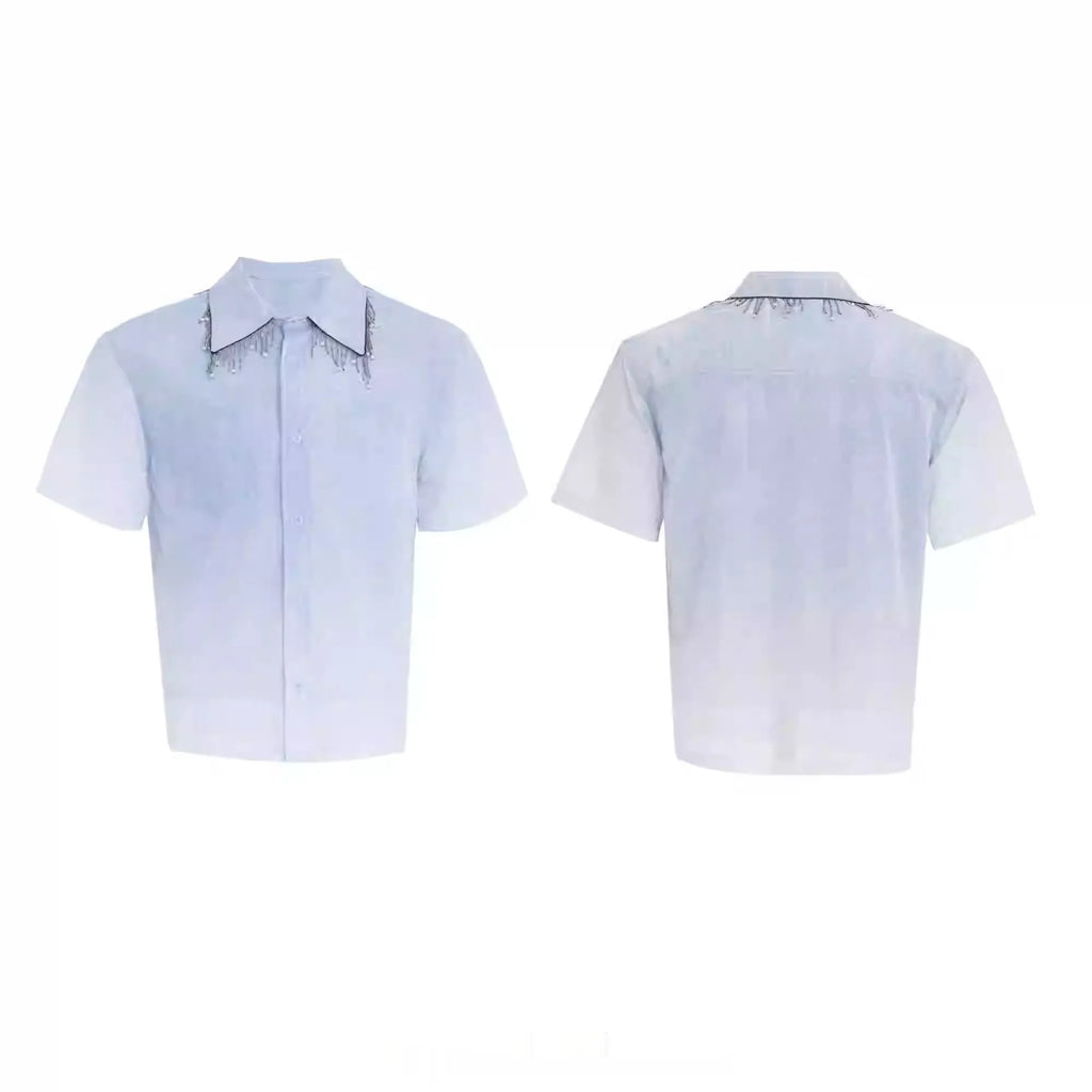 A blue and white gradient loose short-sleeve shirt on a hanger.