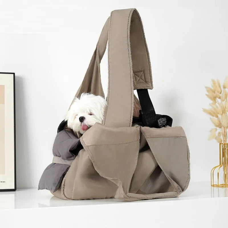 Apricot coloured cloth pet carrier handbag showing portable size.