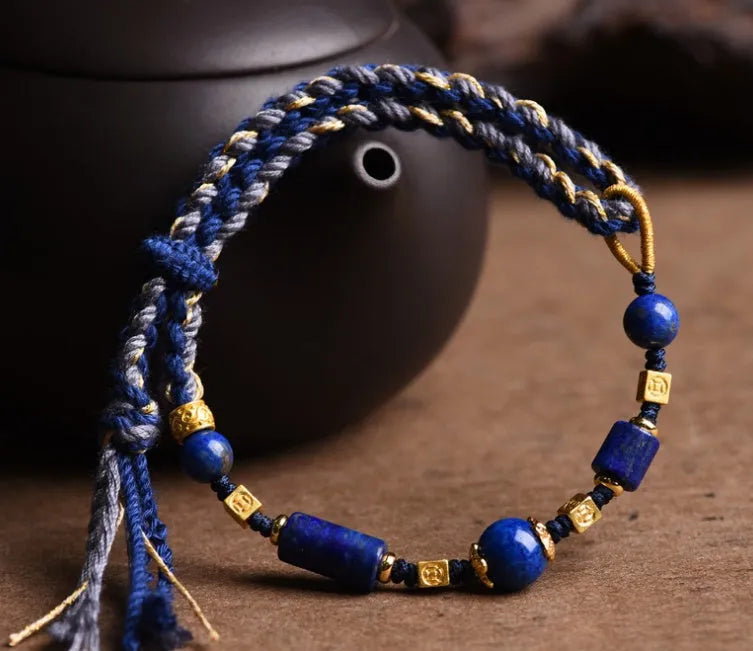 Hand-woven ethnic watch bracelet in flexible wire, showing Hongfei Ebony and Lapis Lazuli colour options.