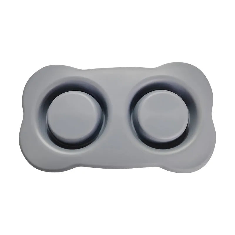 Silicone dog bowl with stainless steel insert in double bowl design, shown in blue colour