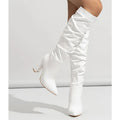 White long women's high heel ankle boot with a pointed toe and a side zipper.