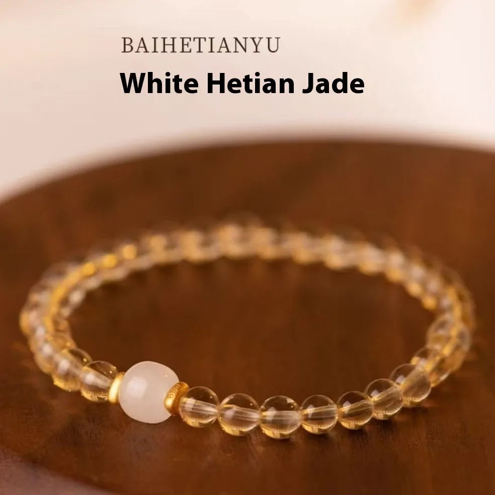 Handmade unisex bracelet with authentic Brazilian rutilated quartz and pearl elements, in green or white jade.
