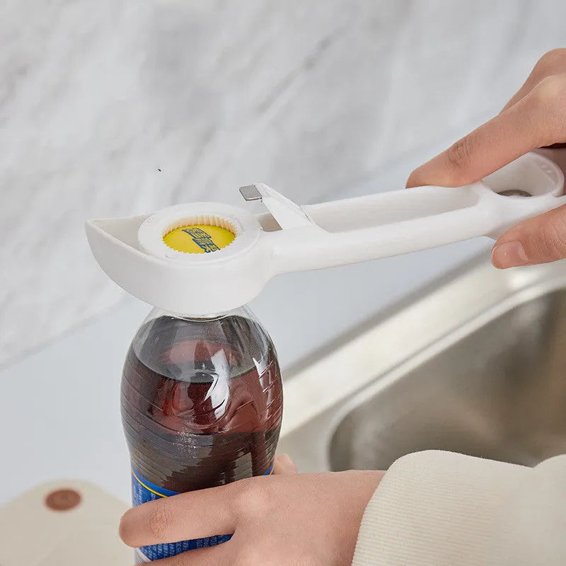 4-in-1 stainless steel and PP manual bottle opener and jar opener in gray blue, 21 cm long, on a white surface