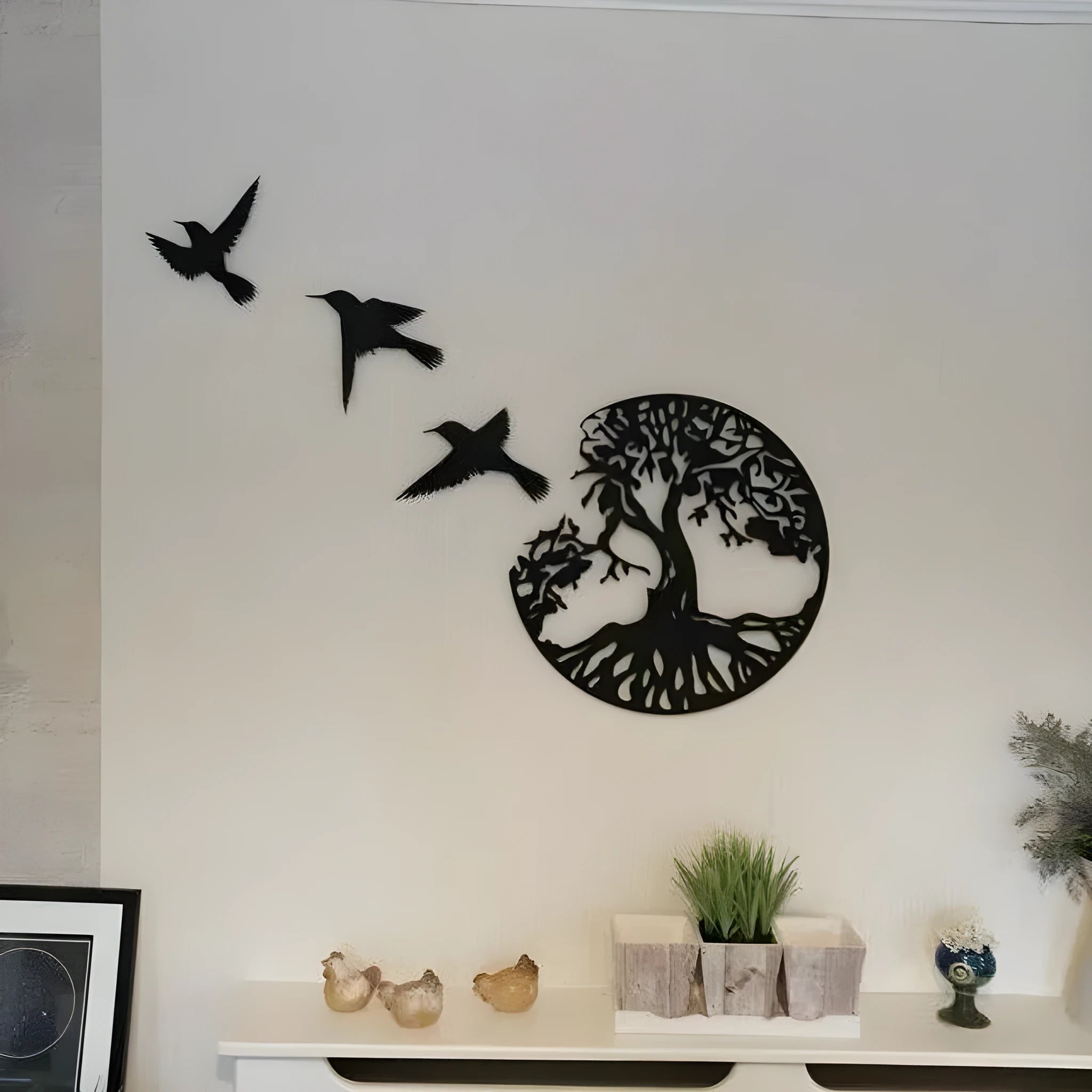 Black electroplated iron wind chime wall hanging in a modern simple style.