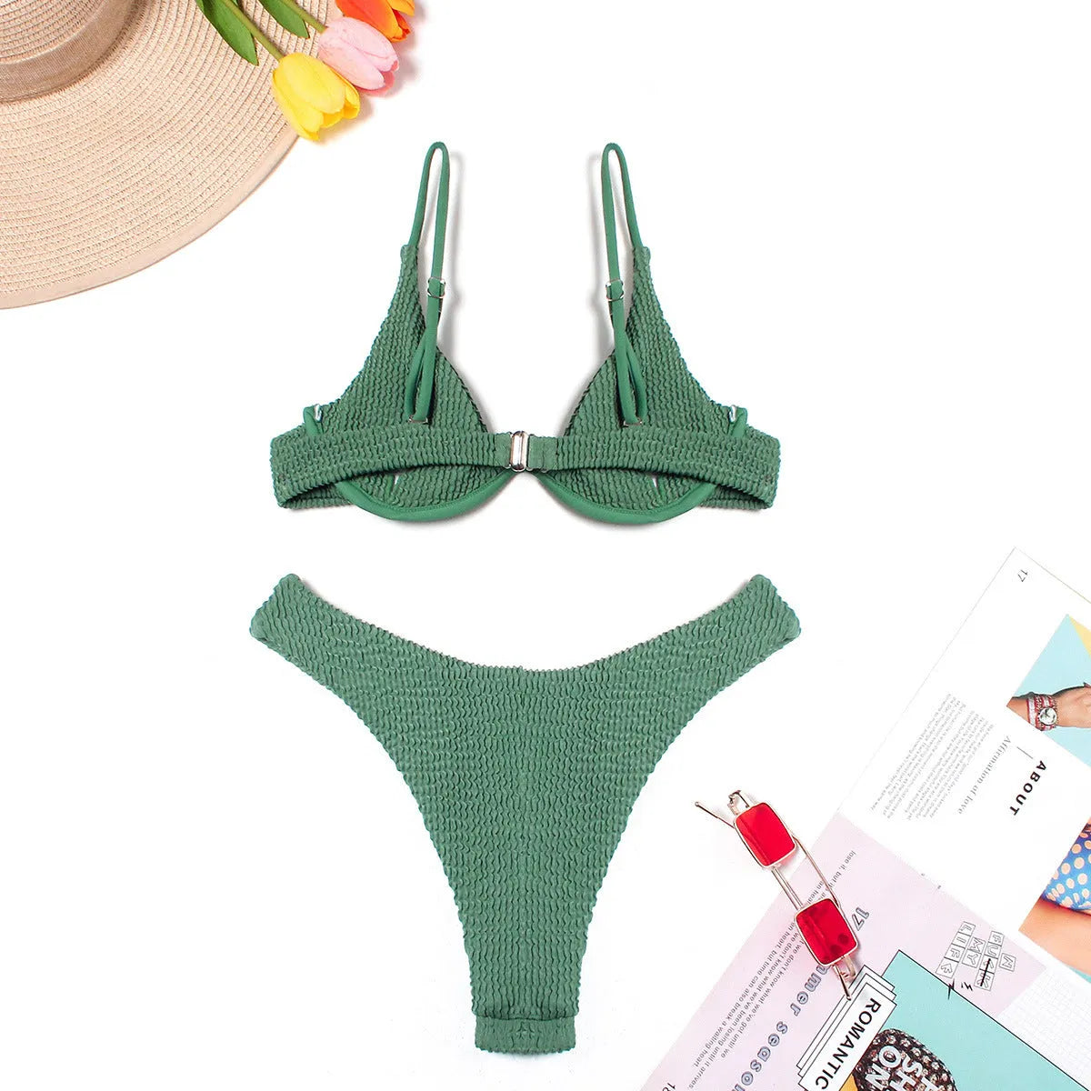 Green women's bikini with ruffle detail on quick-dry polyester fabric.