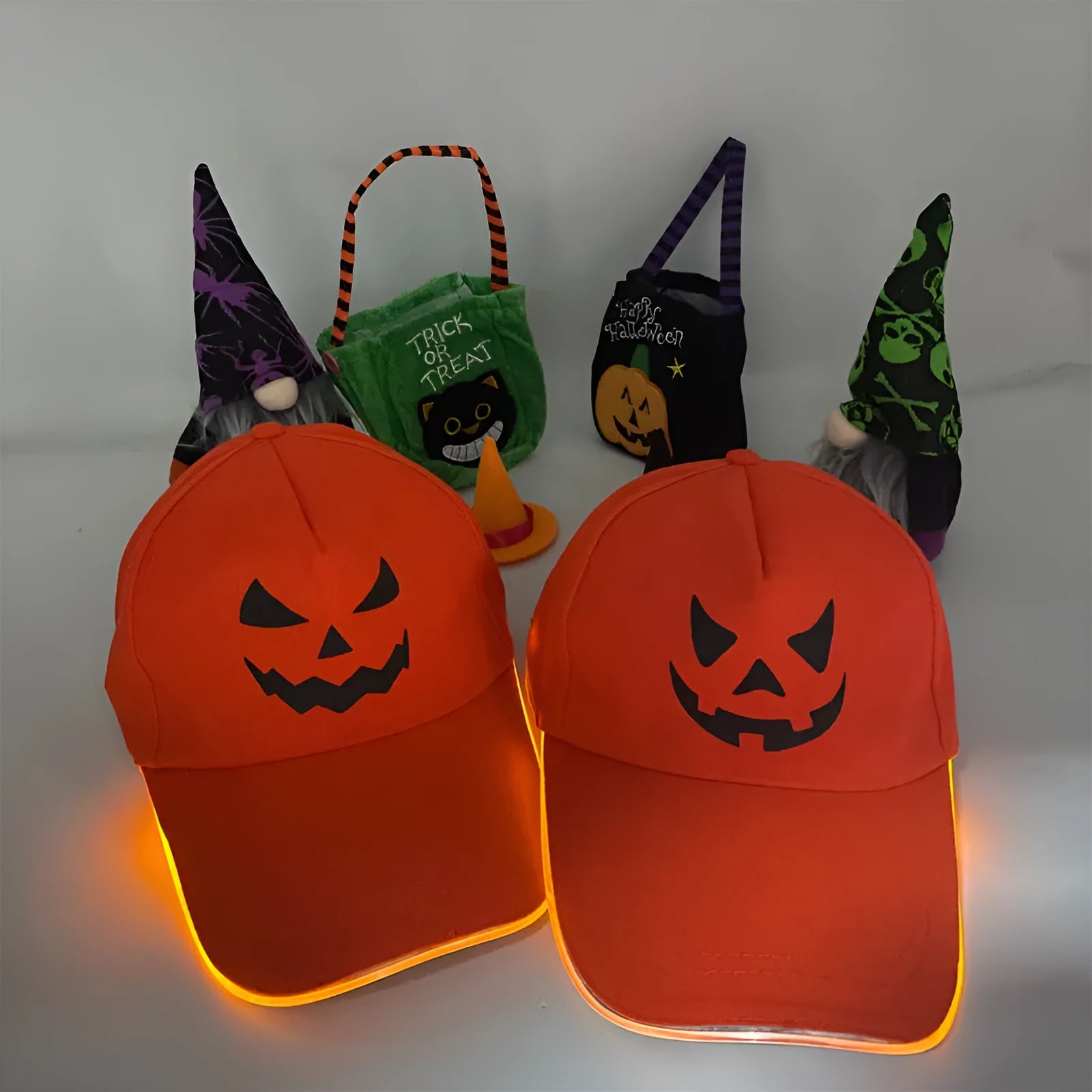 Halloween LED baseball cap with light-up front panel showing pumpkin smile design