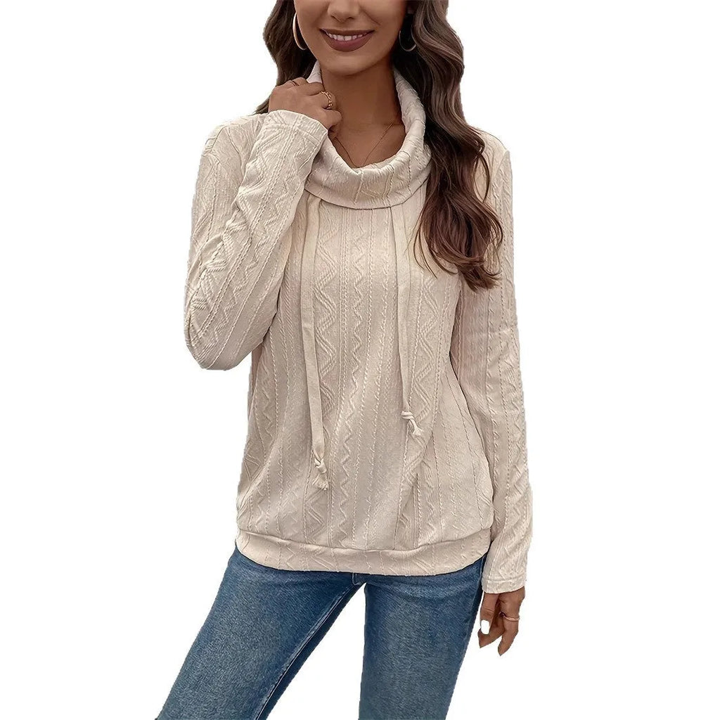 Apricot hooded pullover sweater with long sleeves on hanger