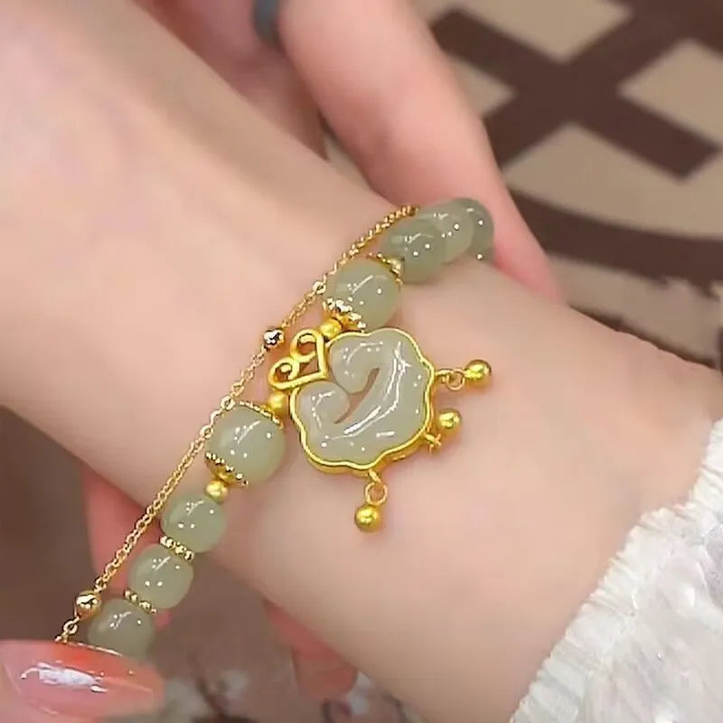 Green women's safety lock bell pendant bracelet with electroplated finish and double-layer construction