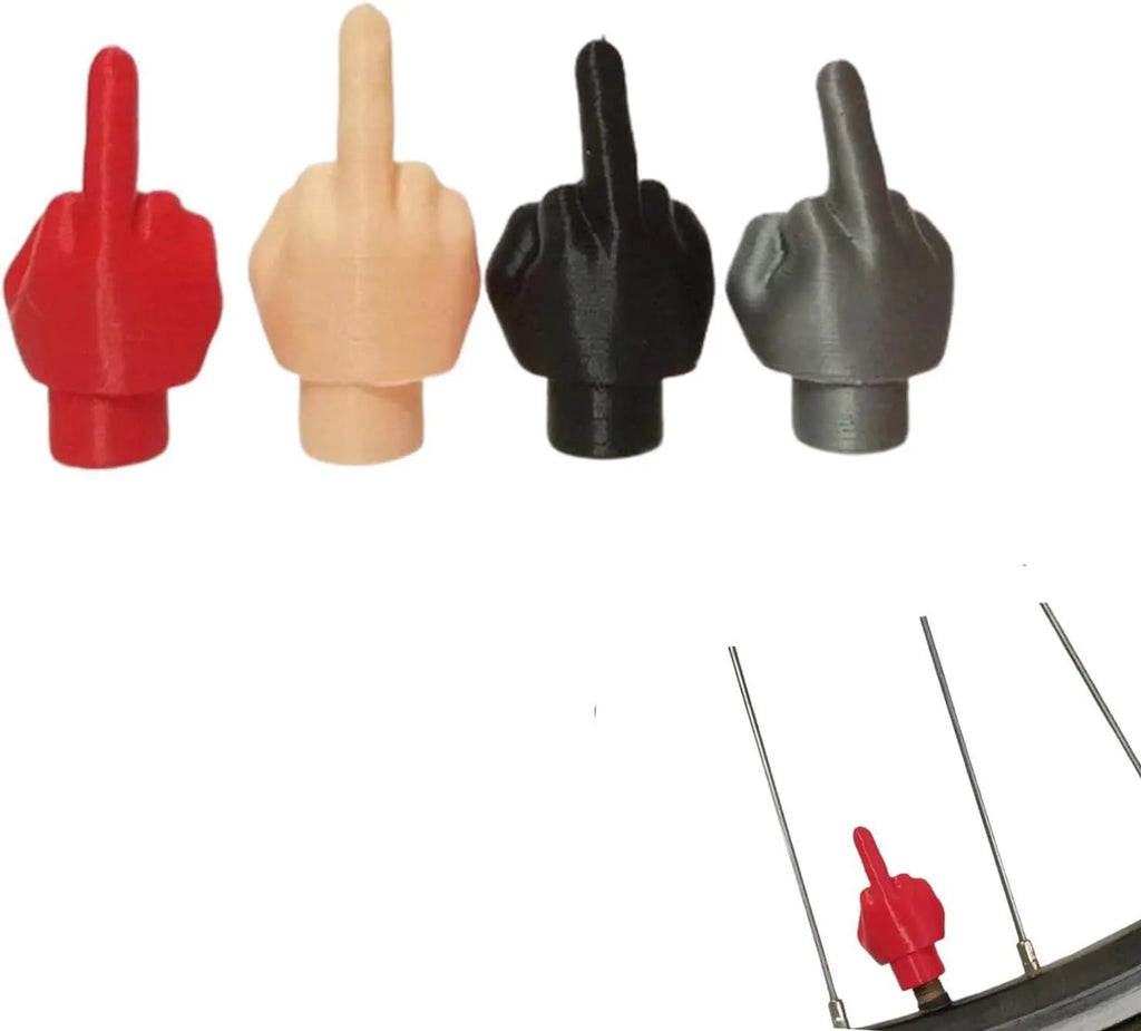Four latex tyre valve dust caps, two black and two skin colour, for car tyre protection.