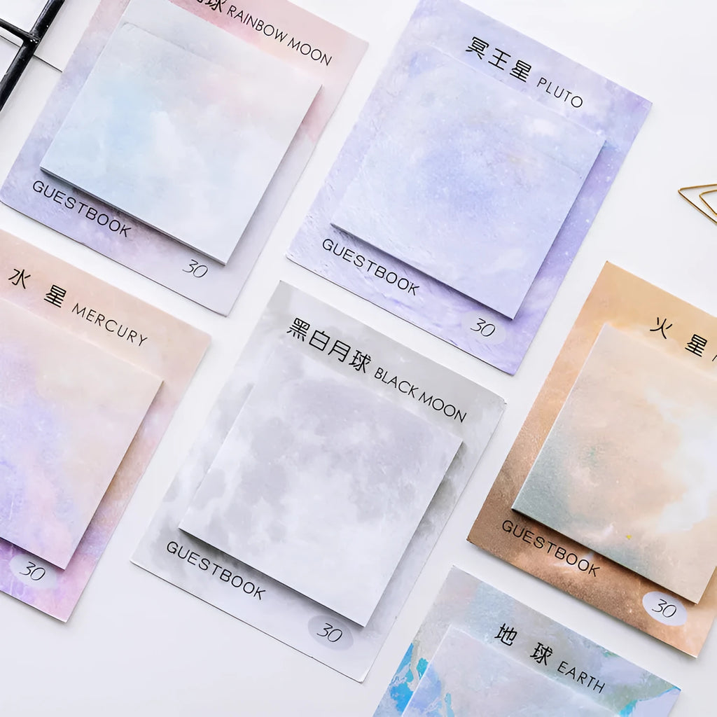 Square planet sticky notes pad showing oil painting designs of Earth, Mars, and moons at 7.3cm size.