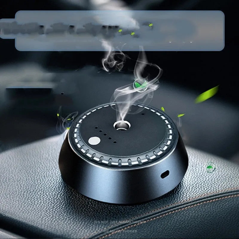 Black metal USB-rechargeable car aroma diffuser with compact 9x4.5cm dimensions
