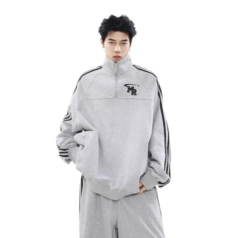Black retro American style stand collar hoodie with long sleeves and polyester fabric construction