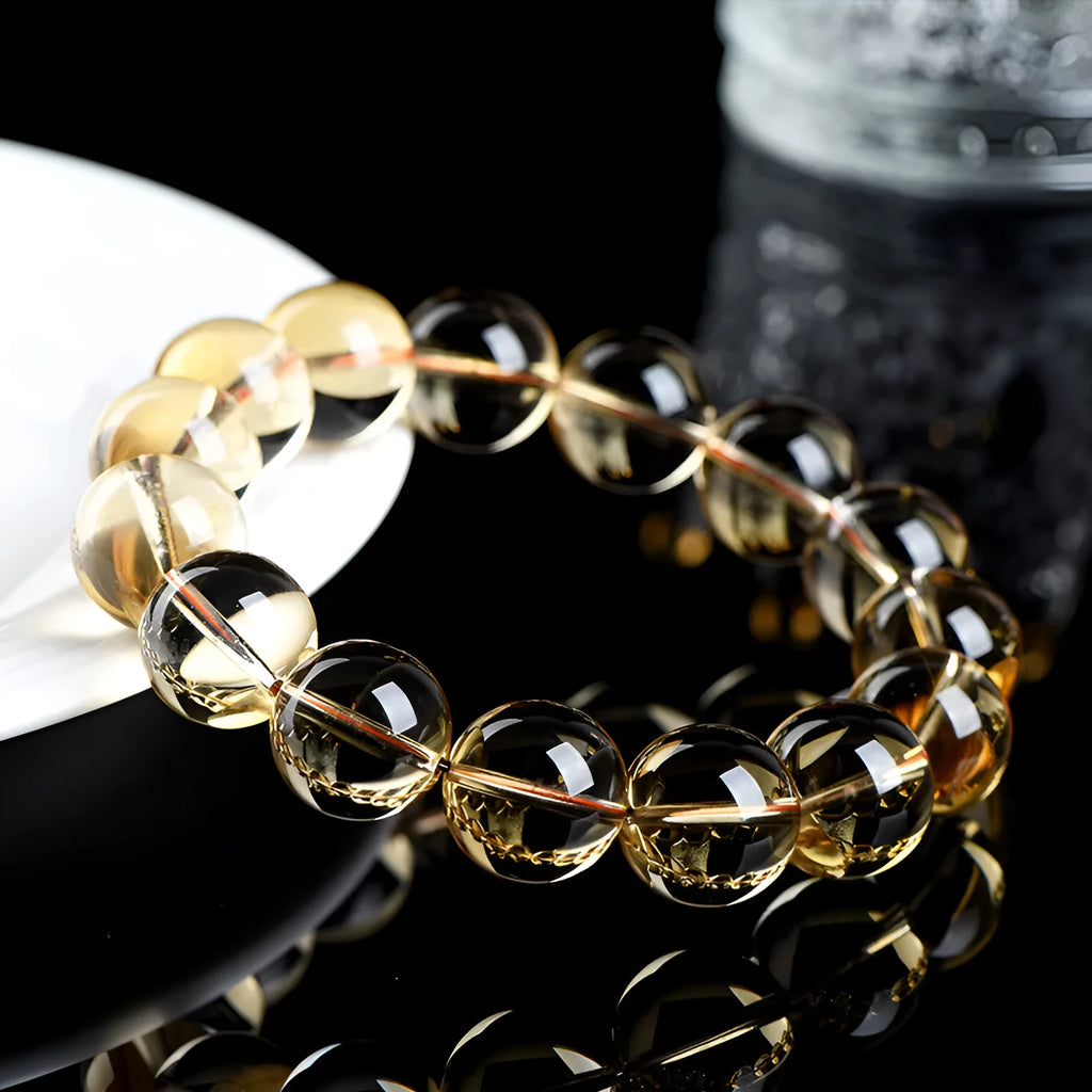 Natural citrine scattered bead bracelet in 7A grade on a wrist, showing polished stones and original design.