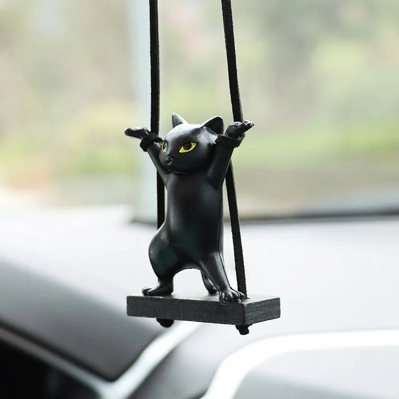 Cartoon-style resin cat pendant for car interior decoration in one of five colour options.