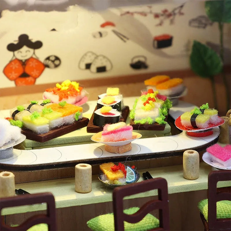Assembled wooden Japanese sushi restaurant model with flash function, 21 by 32 by 5.5 centimetres, on a white background.