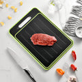 Square grey aluminium cutting board with double-sided design showing grinding teeth and integrated knife sharpener
