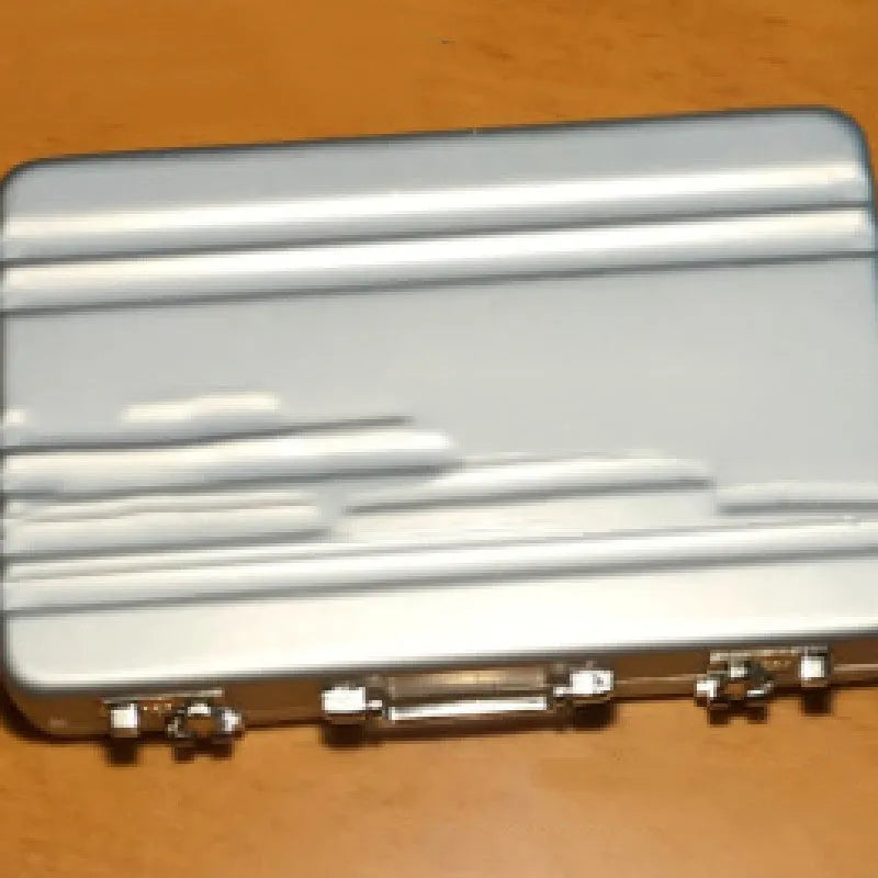 Aluminium alloy metal card holder in black showing slim 16mm profile and compact dimensions