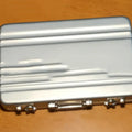 Aluminium alloy metal card holder in black showing slim 16mm profile and compact dimensions