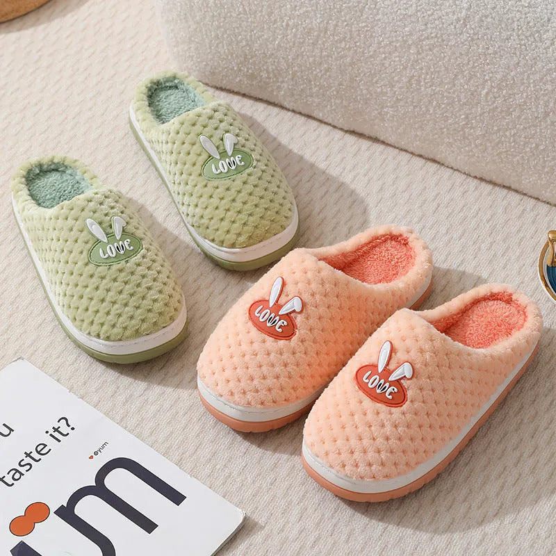 Women's rabbit plaid design artificial fur slippers with a thick rubber sole in various colours.