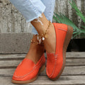 Women's flat loafer shoe in PU leather with car suture detail and a round toe, shown in a choice of colours.