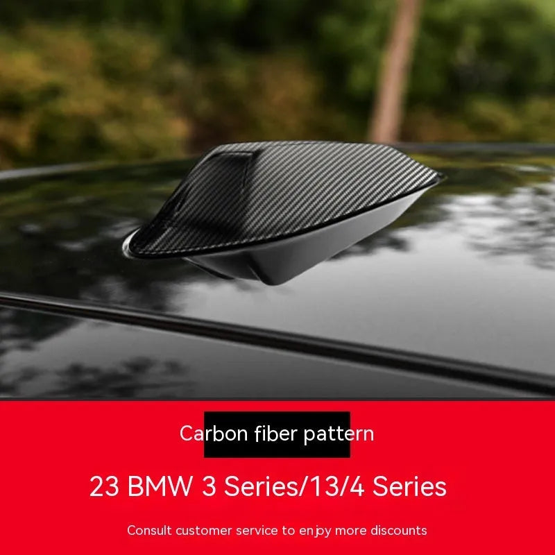 BMW shark fin antenna cover in carbon fibre pattern and piano black finish options.