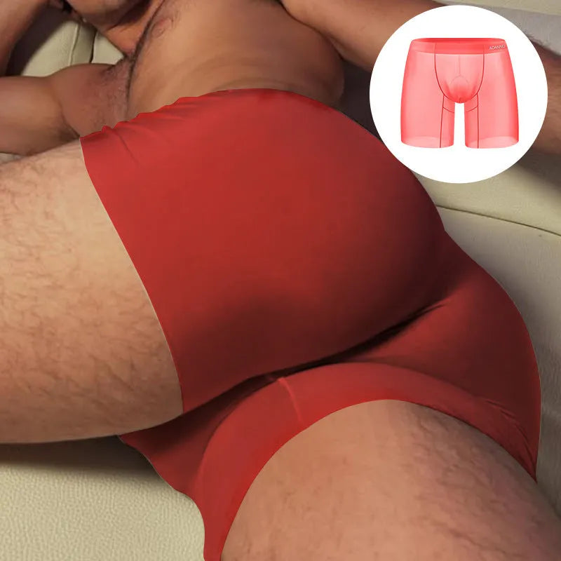 Men's orange seamless nylon boxer shorts with low waist and hip-lift design.
