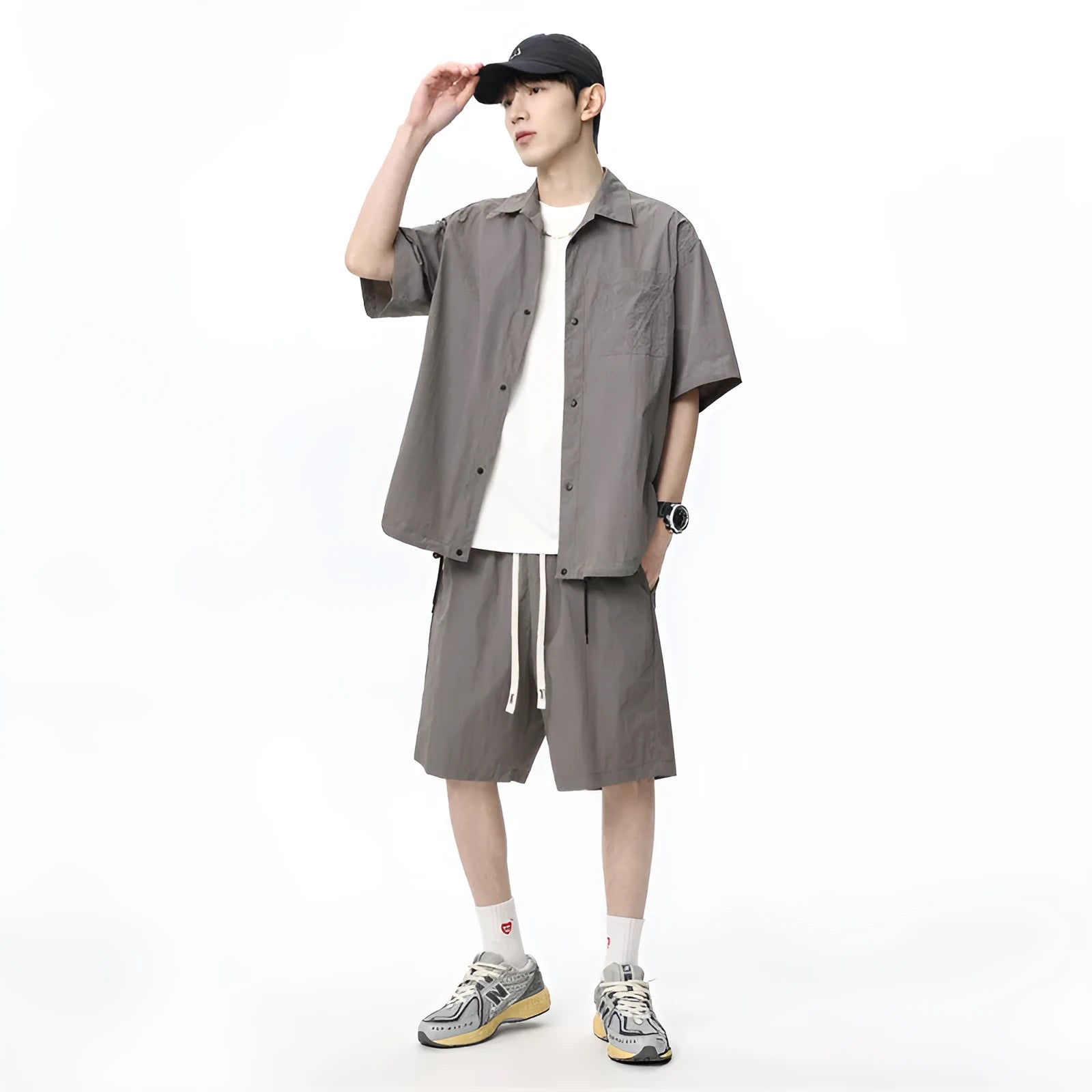 Men's dark grey loose shorts and casual shirt two-piece set made from hemp-blend fabric.