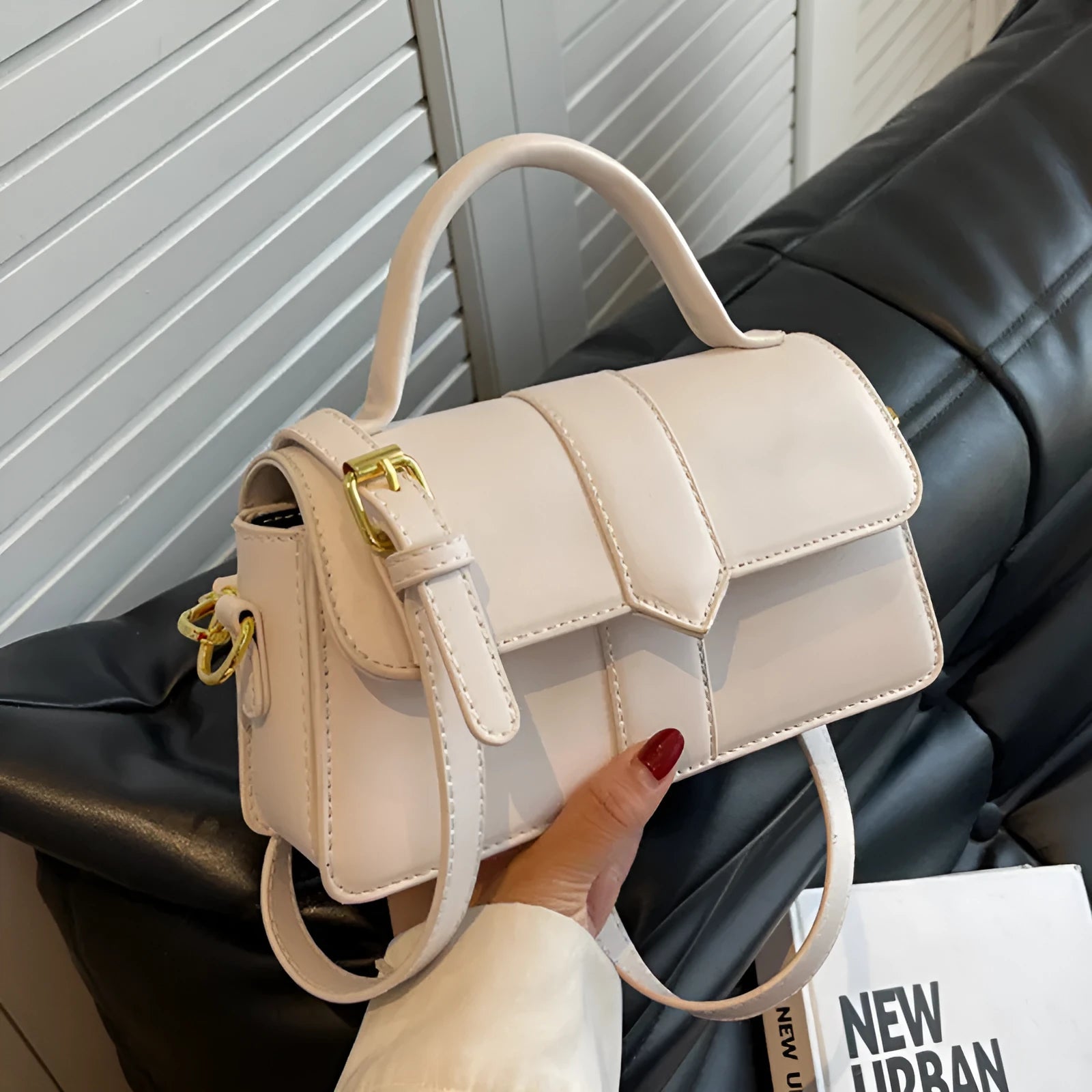 Women's PU leather messenger bag in horizontal square shape with sandwich pocket and file organisation