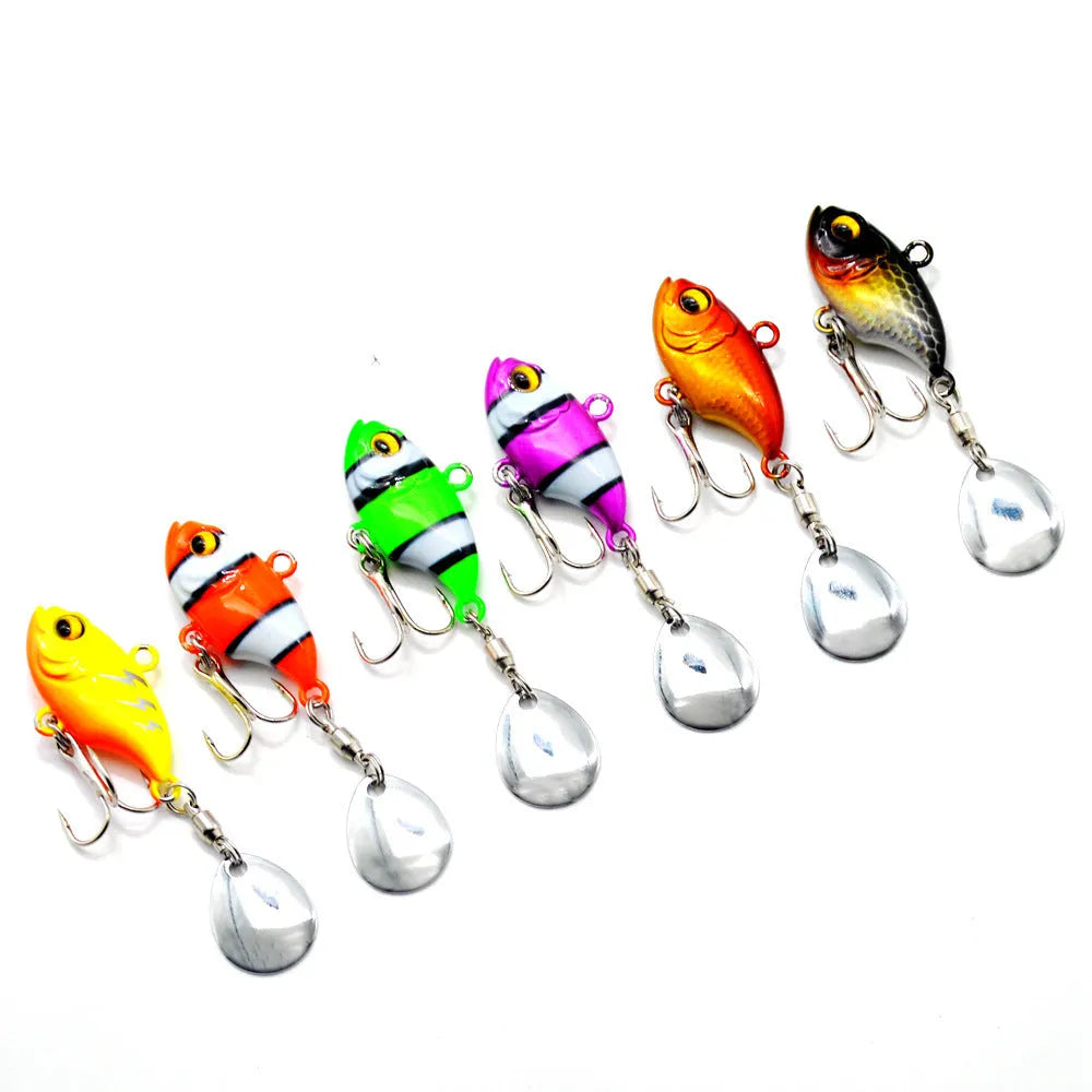 Metal sea fishing iron plate lure with small rotating sequins in gold colour variant.