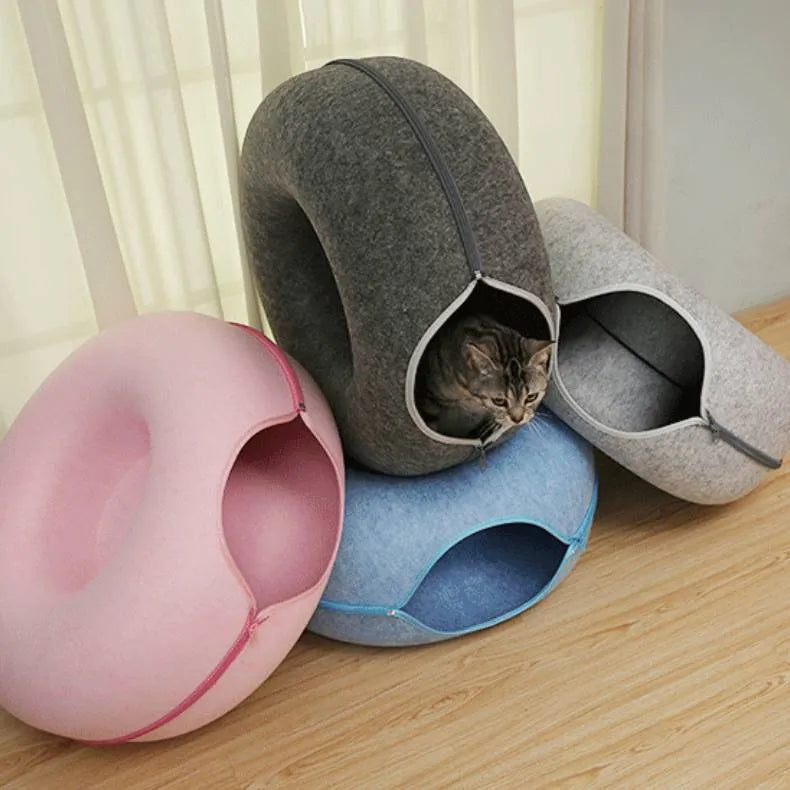 Round felt donut cat tunnel bed in light grey with open entrance, suitable for indoor cats