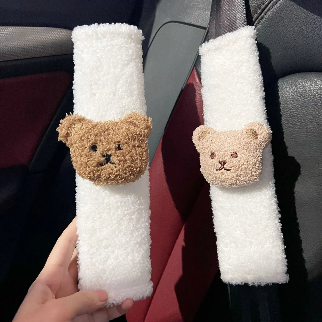 Cartoon bear plush seat belt shoulder cover for child car safety measuring 25cm by 6.5cm by 5cm.