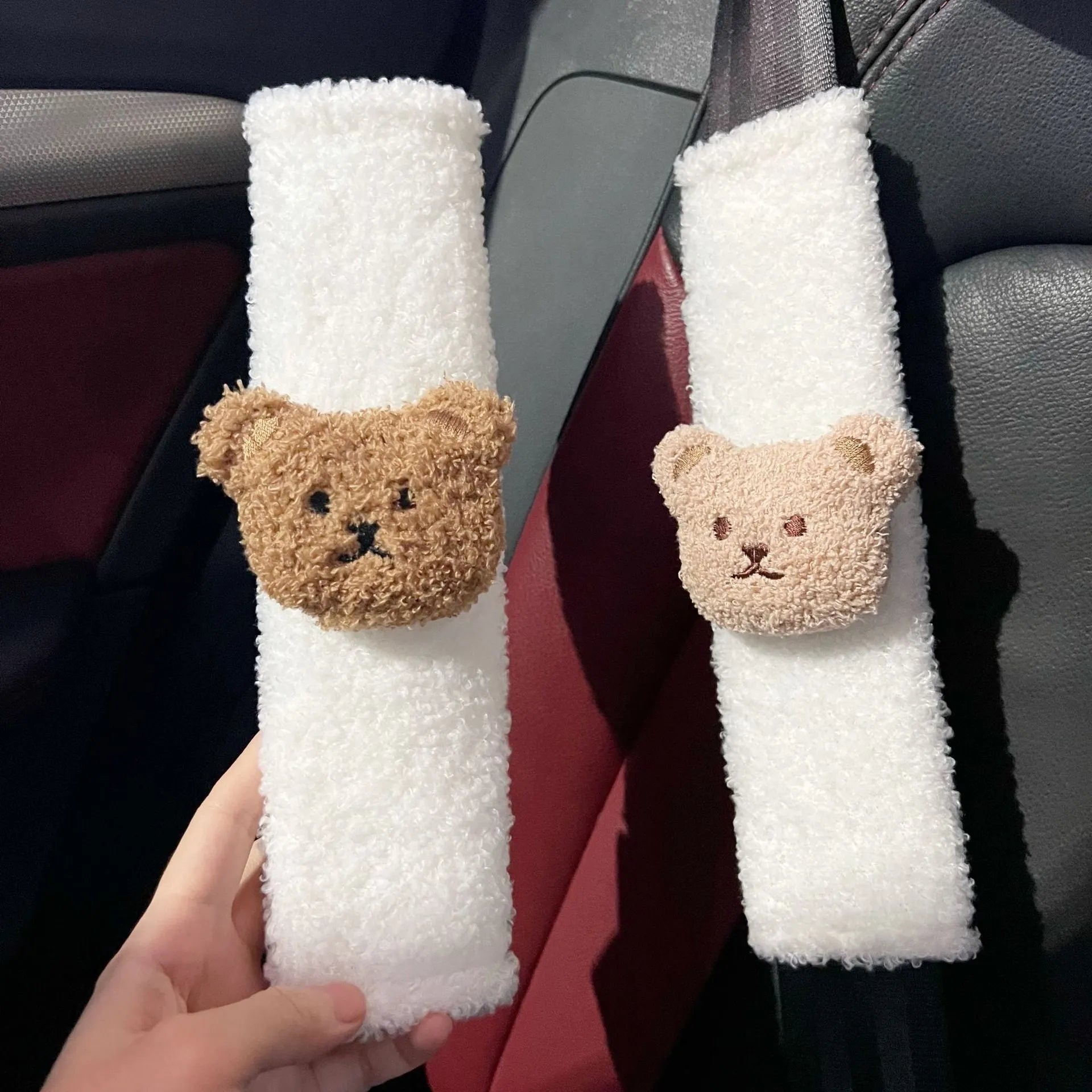 Cartoon bear plush seat belt shoulder cover for child car safety measuring 25cm by 6.5cm by 5cm.