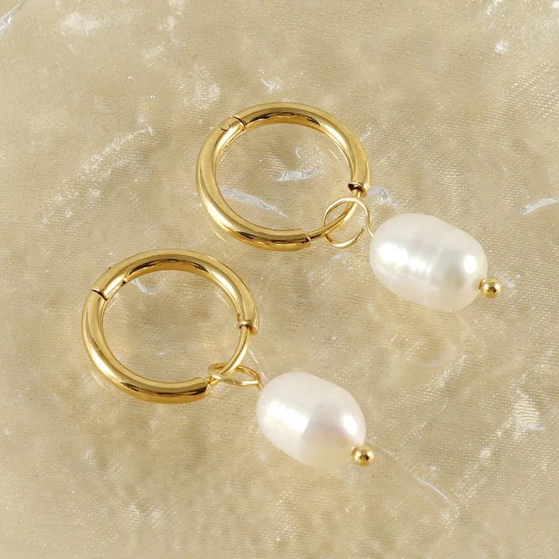 Gold coloured geometric women's earrings with a freshwater pearl, made from stainless steel and titanium steel.
