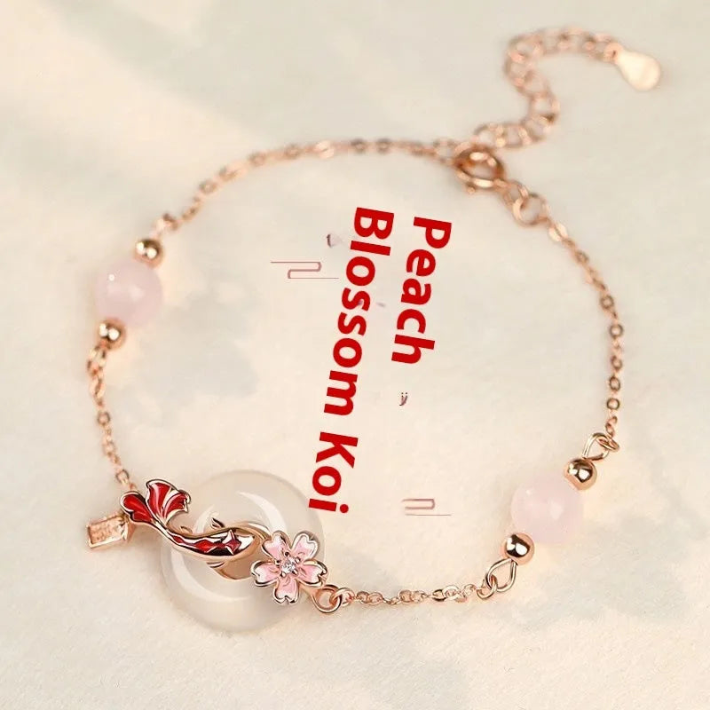 S925 sterling silver women's bracelet with white chalcedony crystal and Koi-themed new Chinese floral design.