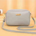 Women's solid colour PU shoulder bag with three-dimensional pocket in horizontal square shape