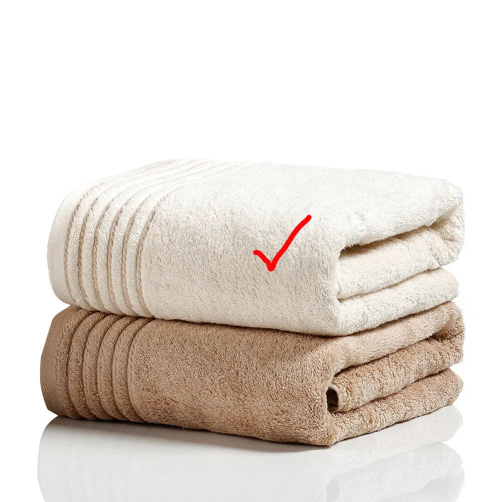 Cotton towel set showing beige and brown options with 34cm and 70cm sizes